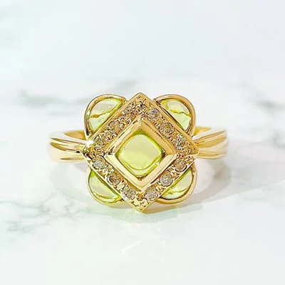 We bought Peridot Ring K18YG